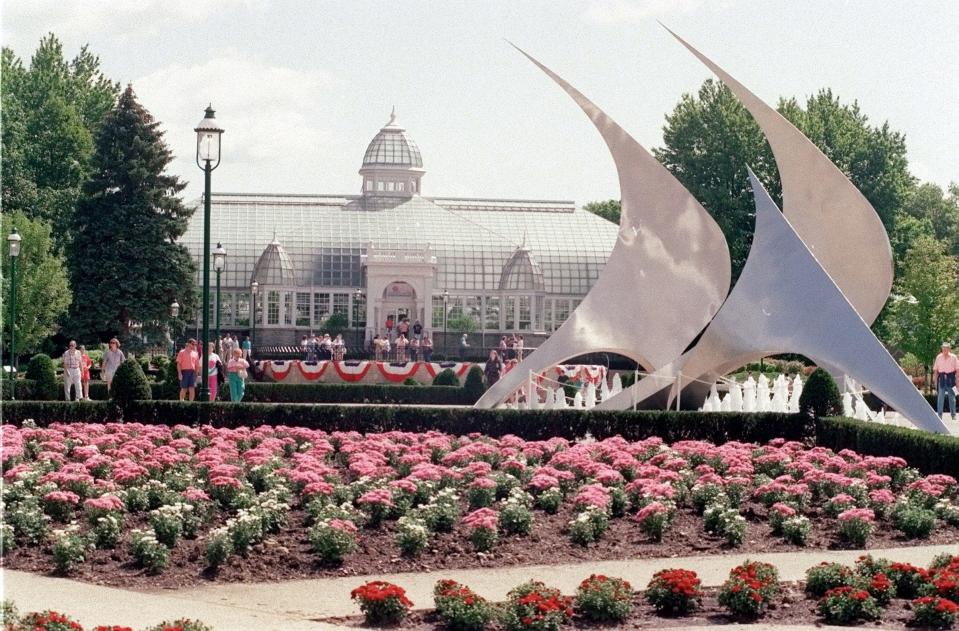 FILE - AMERIFLORA 1992 - A sea of Chrysanthemums lead the eyes of visitors to the Navstar sculpture on the right and to the Franklin Park Conservatory in the background on a bright sunny August 29, 1992 afternoon.
