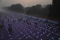 Chair are kept at a mandatory distance as a precaution against the coronavirus at Rajpath for the Republic Day parade in New Delhi, India, Tuesday, Jan. 26, 2021. (AP Photo/Manish Swarup)