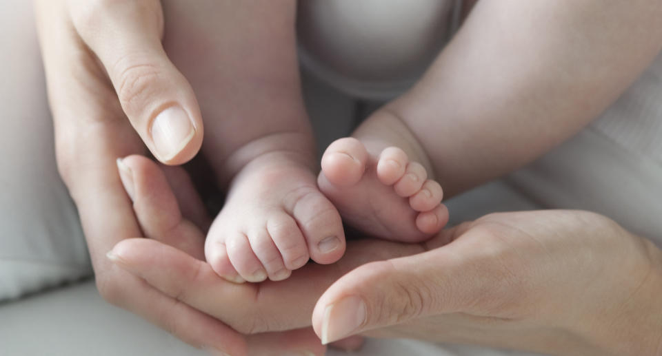 Paramedics were called to a Greenslopes property on Saturday where the infant was reported to have fallen from three storeys up. Source: AAP, file