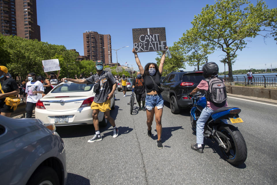 Protesters take to the FDR drive after marching through Harlem during a solidarity rally for George Floyd, Saturday, May 30, 2020, in New York. Floyd died after Minneapolis police officer Derek Chauvin pressed his knee into his neck for several minutes even after he stopped moving and pleading for air. (AP Photo/Mary Altaffer)
