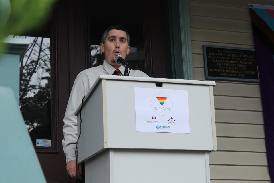 Newport Health Equity Zone Strategy Specialist Rex LeBeau addresses a small group in front of Newport Women's Resource Center on Oct. 28 to announce the two new LGBTQ Safe Zones.