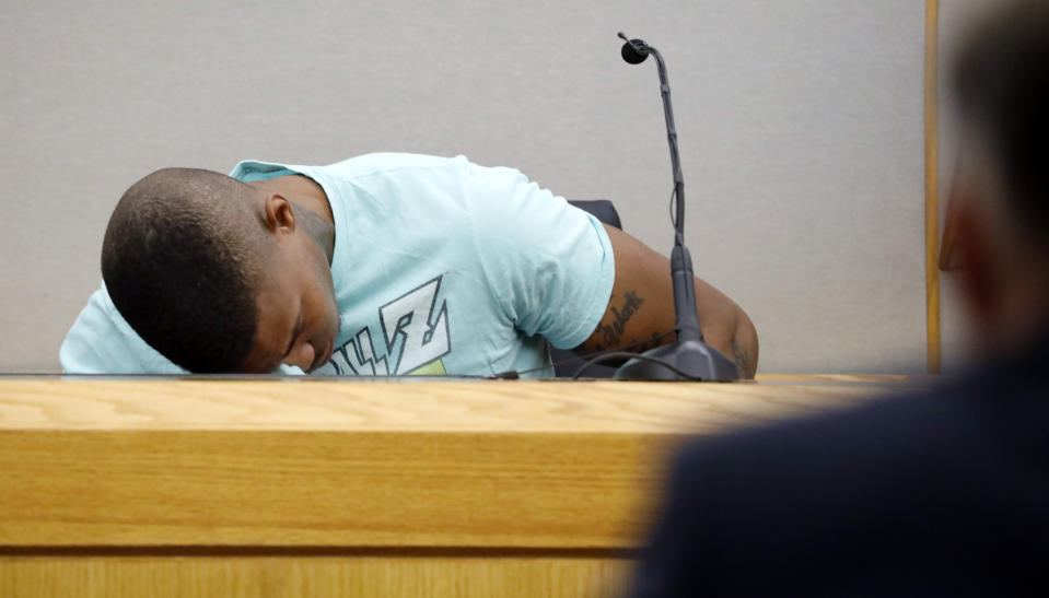 FILE - In this Tuesday, Sept. 24, 2019, file photo, Joshua Brown, a neighbor of victim Botham Jean, is overcome with emotion while giving testimony in court, in Dallas, after recounting how he'd heard Jean singing gospel and Drake songs across the hall before he was fatally shot. Authorities say that Brown was killed in a shooting Friday, Oct. 4. (Tom Fox/The Dallas Morning News via AP, Pool, File)