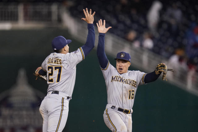 Washington Nationals second baseman Jordy Mercer throws to first