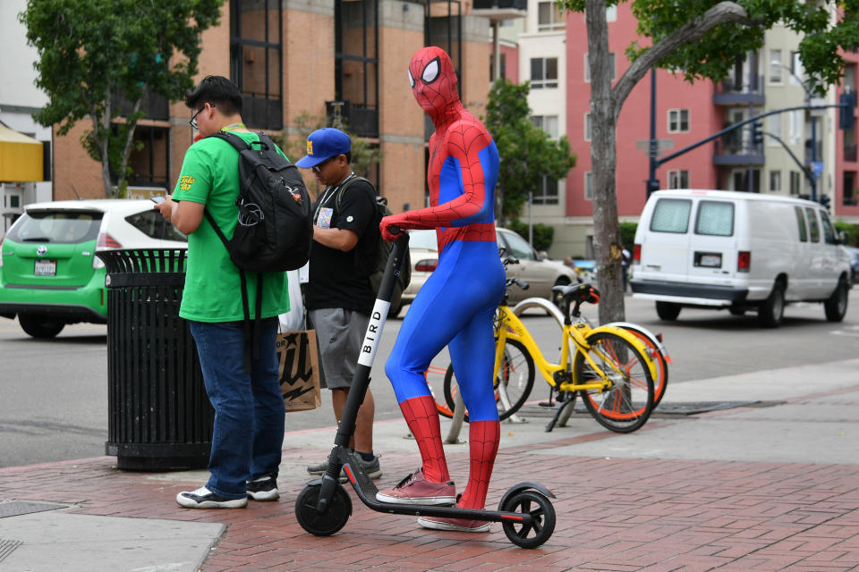 SAN DIEGO, CA - JULY 20:  A cosplayer dressed as Spiderman poses on an electric scooter at San Diego Comic-Con International 2018 on July 20, 2018 in San Diego, California.  (Photo by Dia Dipasupil/Getty Images)