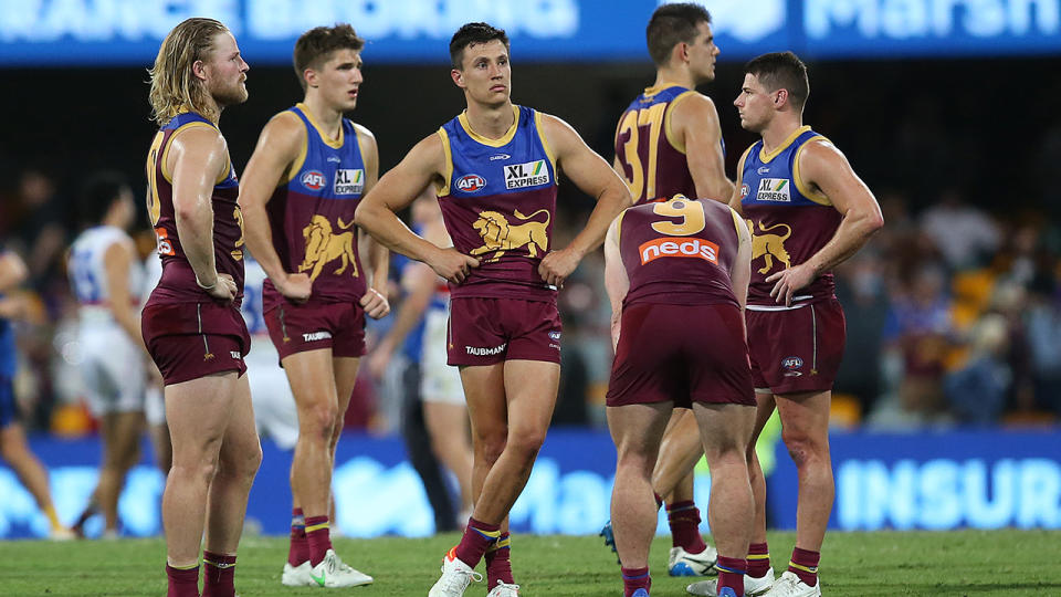 The Brisbane Lions were utterly dejected after their one-point loss to the Western Bulldogs in the AFL semi-final last weekend. (Photo by Jono Searle/AFL Photos/via Getty Images)