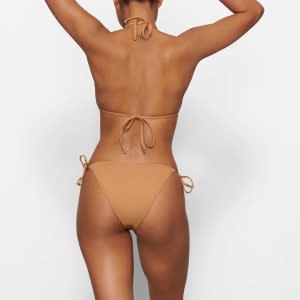 Kim Kardashian's SKIMS Swim Collection Is Back After 500K Waitlist