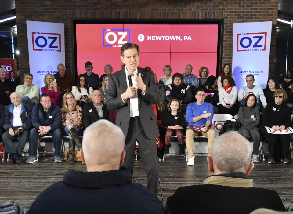 Mehmet Oz, the TV celebrity and heart surgeon who is running for the Republican nomination for U.S. Senate in Pennsylvania, speaks at a town hall-style event at the Newtown Athletic Club, Feb. 20, 2022, in Newtown, Pa. (AP Photo/Marc Levy)