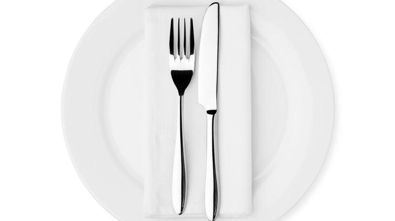 Fork and knife on a plate