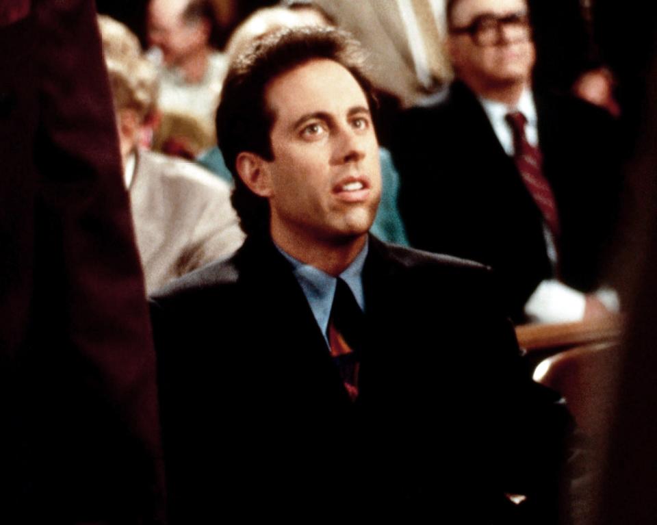 A closeup of Seinfeld in the courthouse