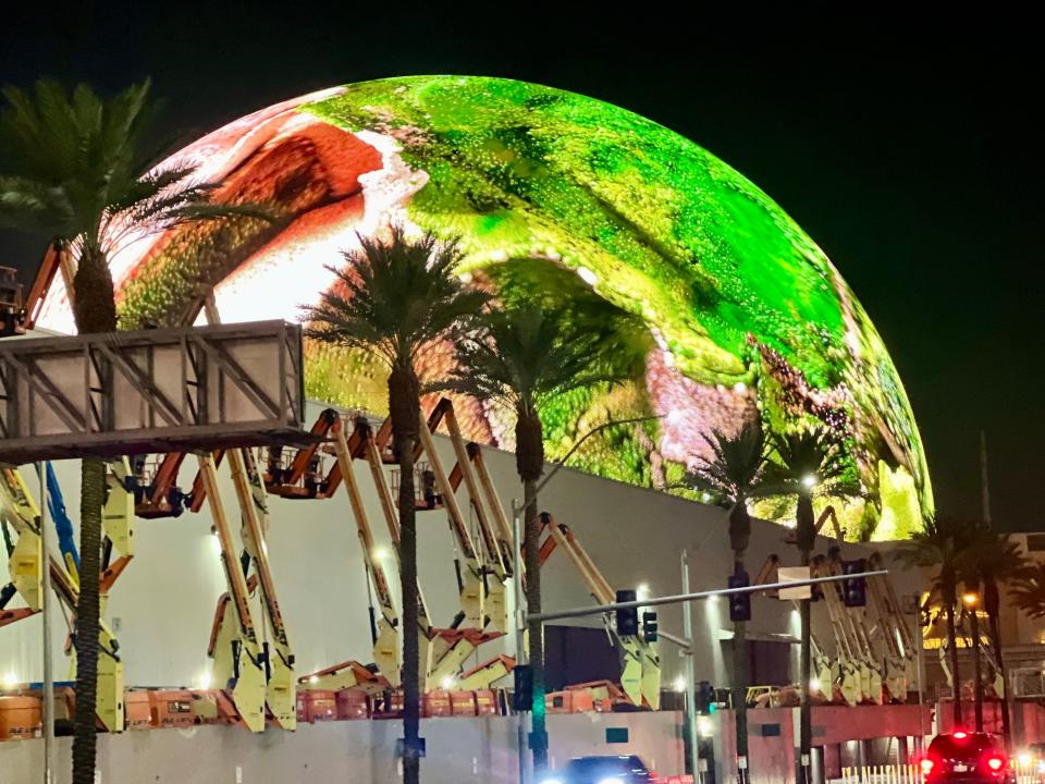 Walking up to the Sphere, which is green and red.