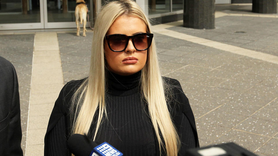 McKenzie Robinson is seen here outside Brisbane Magistrates Court on Thursday.