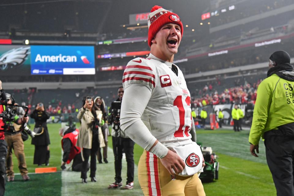 49ers quarterback Brock Purdy walks off the field after a win Sunday against the Eagles in Philadelphia.