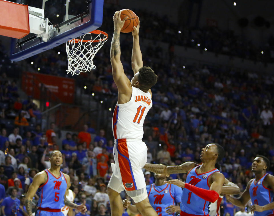 Florida guard Keyontae Johnson (11) goes up for a dunk against Mississippi during an NCAA college basketball game Tuesday, Jan. 14, 2020, in Gainesville, Fla. (Brad McClenny/The Gainesville Sun via AP)