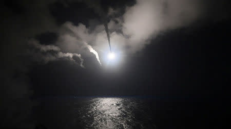 U.S. Navy guided-missile destroyer USS Porter conducts strike operations against Syria in the Mediterranean Sea. Ford Williams/Courtesy U.S. Navy