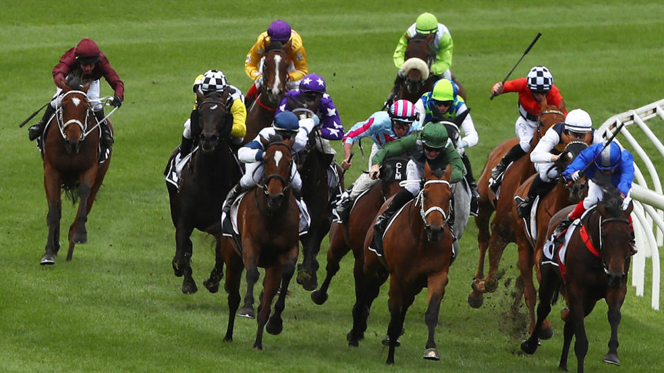 Horses are pictured racing at the Flemington Racecourse in Melbourne.