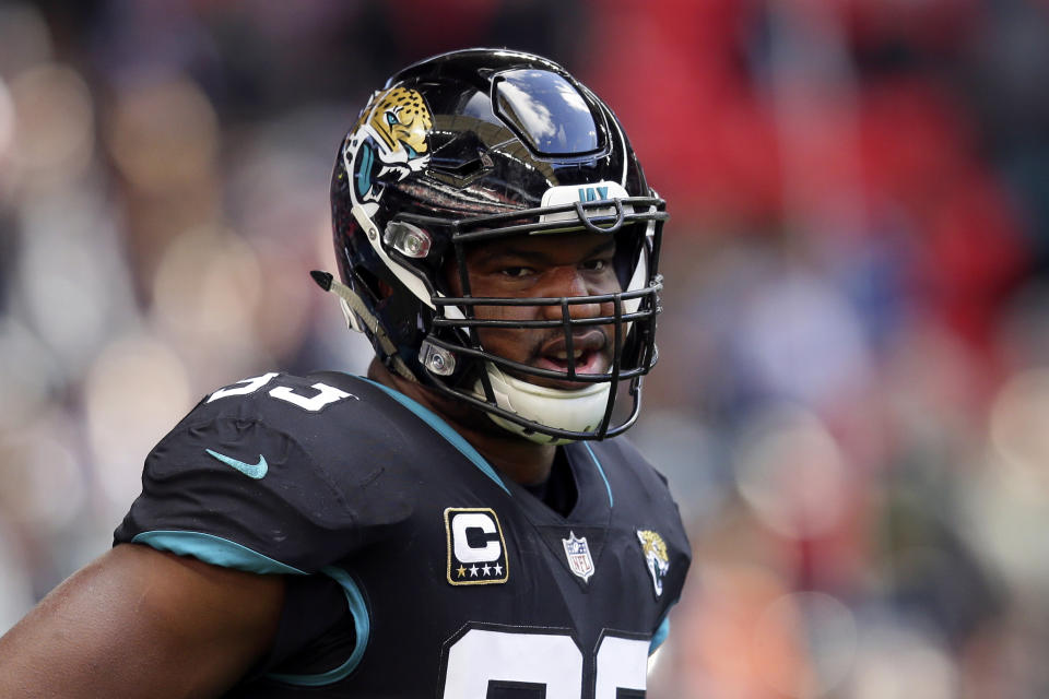 FILE - In this Oct. 28, 2018, file photo, Oct. 28, 2018. Jacksonville Jaguars defensive end Calais Campbell (93) during the warm-up before an NFL football game against Philadelphia Eagles at Wembley stadium in London. Armed with a new contract after being traded from Jacksonville to Baltimore, five-time Pro Bowl defensive end hopes to be a difference-maker in the Ravens' bid to reach the Super Bowl. (AP Photo/Tim Ireland, File)