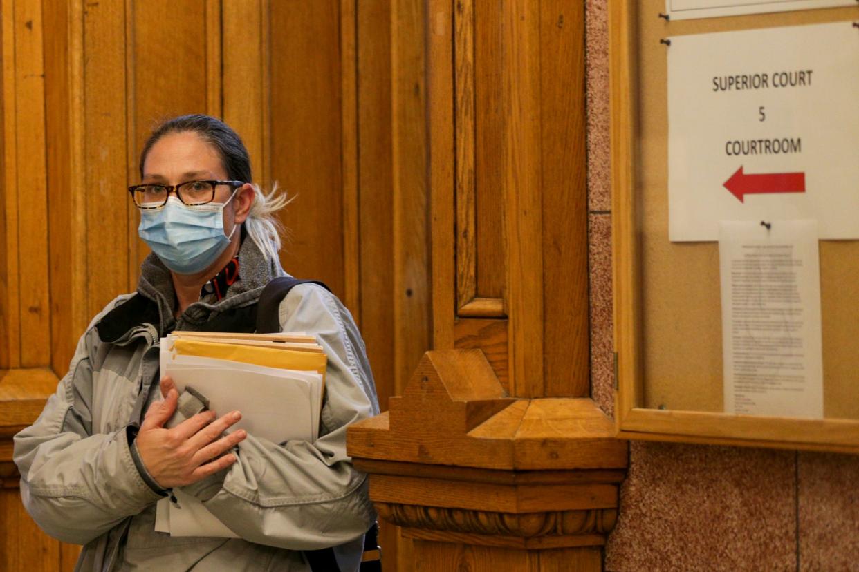 Jennifer Teising, Wabash Trustee, walks out of Tippecanoe County Superior 5 after the first day of her felony theft trial, Monday, Dec. 13, 2021 in Lafayette. A grand jury indicted Teising on May 12 on 20 counts of felony theft for receiving her salary while allegedly not living in the township, as required by law. Teising's bench trial is scheduled through Wednesday before Judge Kristen McVey.