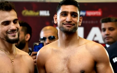 Amir Khan defeats Phil Lo Greco by TKO inside 40 seconds on return to the ring