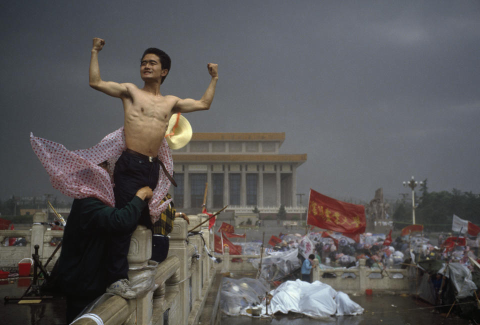 “This is an image that changed everything because, for me, it crystallised the spirit of revolt. The uprising in Tiananmen Square was one of the most moving events I’ve witnessed. It was a tragedy to see unarmed young people shot down in cold blood. It was a movement for freedom of expression, for basic rights, and against the outrage of official corruption. It ended badly, a stain on the reputation of a great country. The facts should not be denied, but discussed, so that people can move on. A lot of things were misreported on both sides. A lot of outside actors were involved that may have worsened the situation for the students and their protest. I want this photograph to be available to people for whom this is an important memory. It symbolises the courage of the time. What it doesn’t show is the bloodshed. I am best known for the image of the tank man. That is called an ‘iconic’ image, but what such images sometimes obscure, with the passing of time, is all the other pictures that lend explanatory power to the story. I’m interested in history, and this landmark event changed my life.” -- Stuart Franklin (Beijing, 1989)