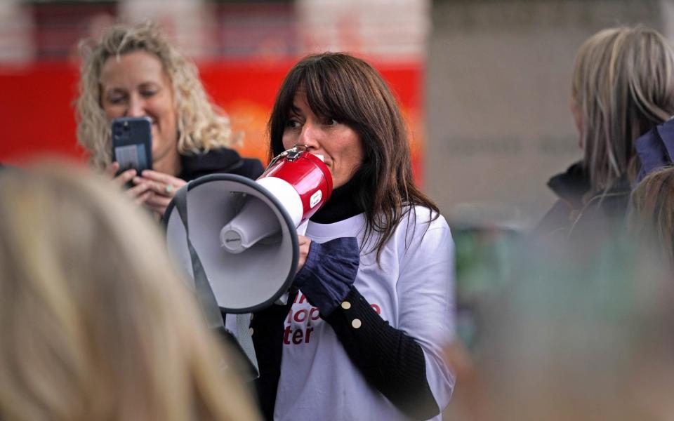 Davina McCall speaks to protesters outside the Houses of Parliament in London demonstrating against prescription charges for HRT - PA