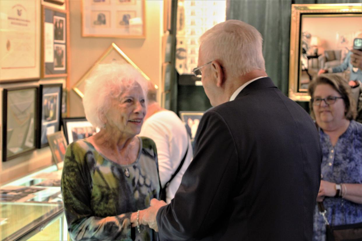 Former U.S. Treasurer Mary Ellen Withrow and former Ohio Gov. Ted Strickland greet each other prior to a ribbon-cutting ceremony celebrating the opening of the Mary Ellen Withrow Collection on Thursday, June 2, 2022, at the Marion County Historical Society. The collection includes a wide range of mementos from Withrow's career in politics.