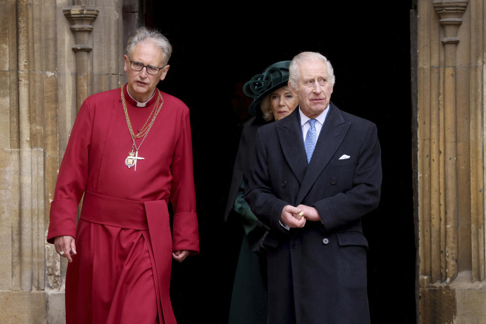 Britain's King Charles III and Queen Camilla leave after attending the Easter Matins Service at St. George's Chapel, Windsor Castle, England, Sunday, March 31, 2024. (Hollie Adams/Pool Photo via AP)