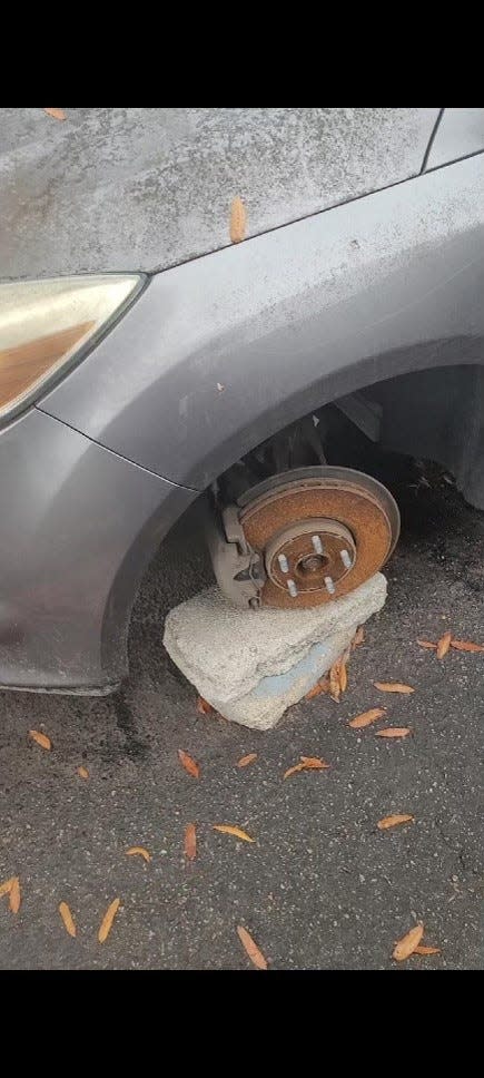 Mark Leary, a retired firefighter from Virginia Beach, Virginia was shocked to find his 2014 Ford Focus missing a tire and up on a cement block when he visited his dealership on Dec. 6, 2022. It had been held for repair of the transmission control module (TCM) since July, having been driven onto the tow truck without incident.