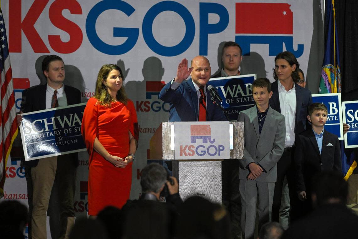 MIchele Schwab looks on as her husband, Republican Scott Schwab, was reelected Kansas Secretary of State, addressed his supporters during a Republican watch party Tuesday night, Nov. 8, 2022, in Topeka, Kansas.