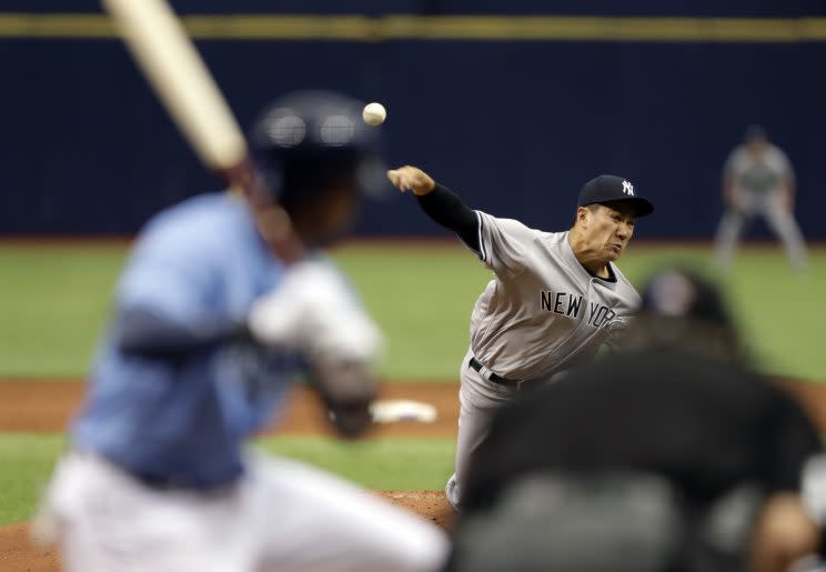 New York Yankees starting pitcher Masahiro Tanaka, of Japan, delivers to the Tampa Bay Rays during the first inning of a baseball game Sunday, April 2, 2017, in St. Petersburg, Fla. (AP Photo/Chris O'Meara)