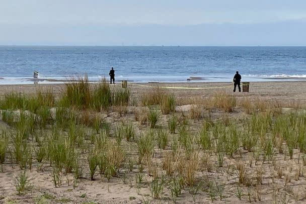 PHOTO: New York Police Department investigators examine a stretch of beach at Coney Island where three children were found dead in the surf, on Sept. 12, 2022, in New York. Authorities have confirmed that the children died by drowning. (Joseph Frederick/AP)