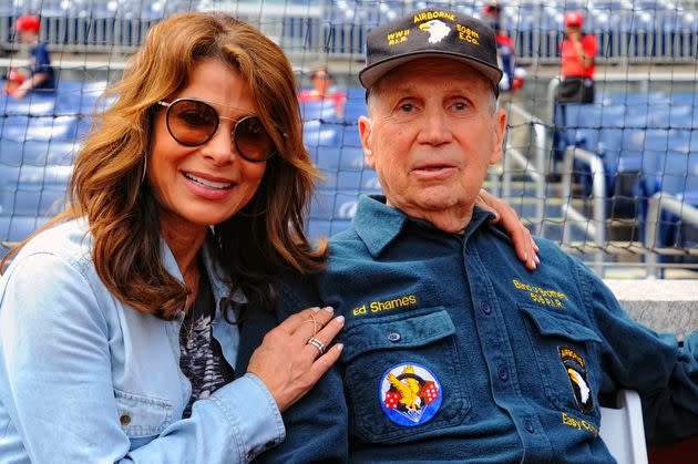 Col. Edward D. Shames sits with Paula Abdul in 2015 on the anniversary of D-Day at Nationals Park in Washington, D.C. (Photo: Icon Sports Wire via Getty Images)