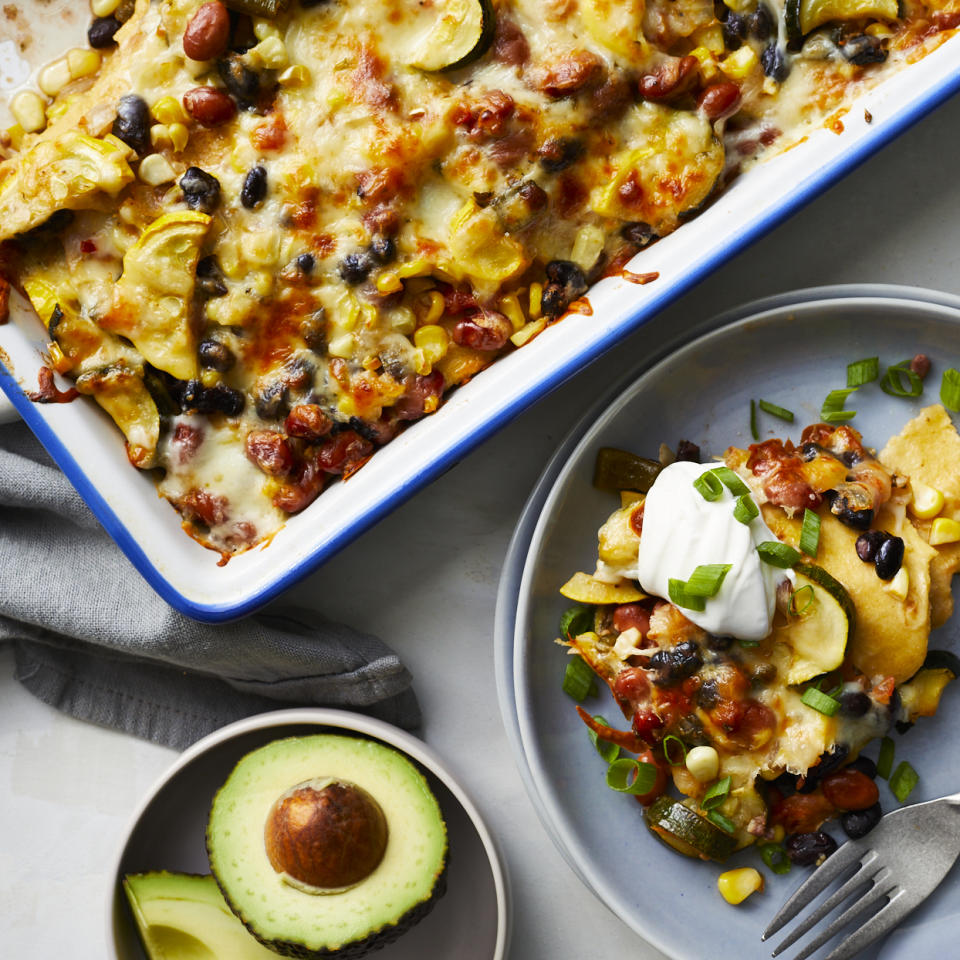 <p>Think of this vegetarian enchilada casserole as a veggie-packed Mexican-inspired lasagna with corn tortillas standing in for the noodles! If your peppers are mild and you like heat, opt for spicy pico de gallo. This easy vegetarian dinner recipe is sure to become a new family favorite. <a href="https://www.eatingwell.com/recipe/278505/vegetarian-enchilada-casserole/" rel="nofollow noopener" target="_blank" data-ylk="slk:View Recipe" class="link ">View Recipe</a></p>