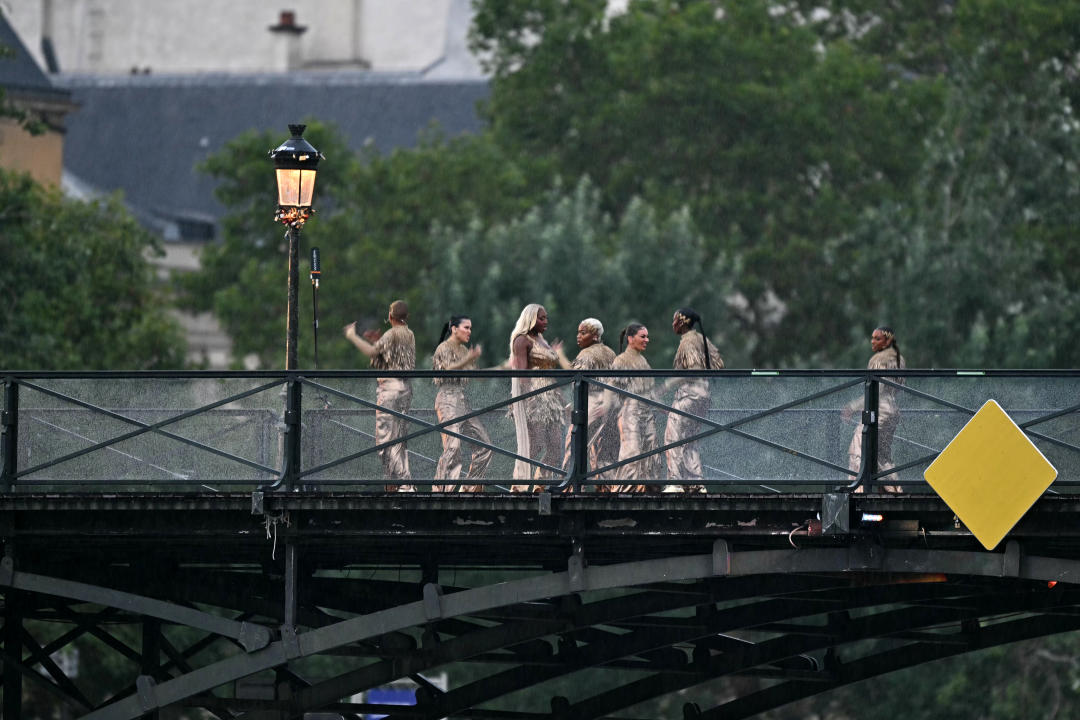 TOPSHOT - Singer Aya Nakamura perfoms on the Pont des Arts footbridge during the opening ceremony of the Paris 2024 Olympic Games in Paris on July 26, 2024. (Photo by Gabriel BOUYS / AFP) (Photo by GABRIEL BOUYS/AFP via Getty Images)