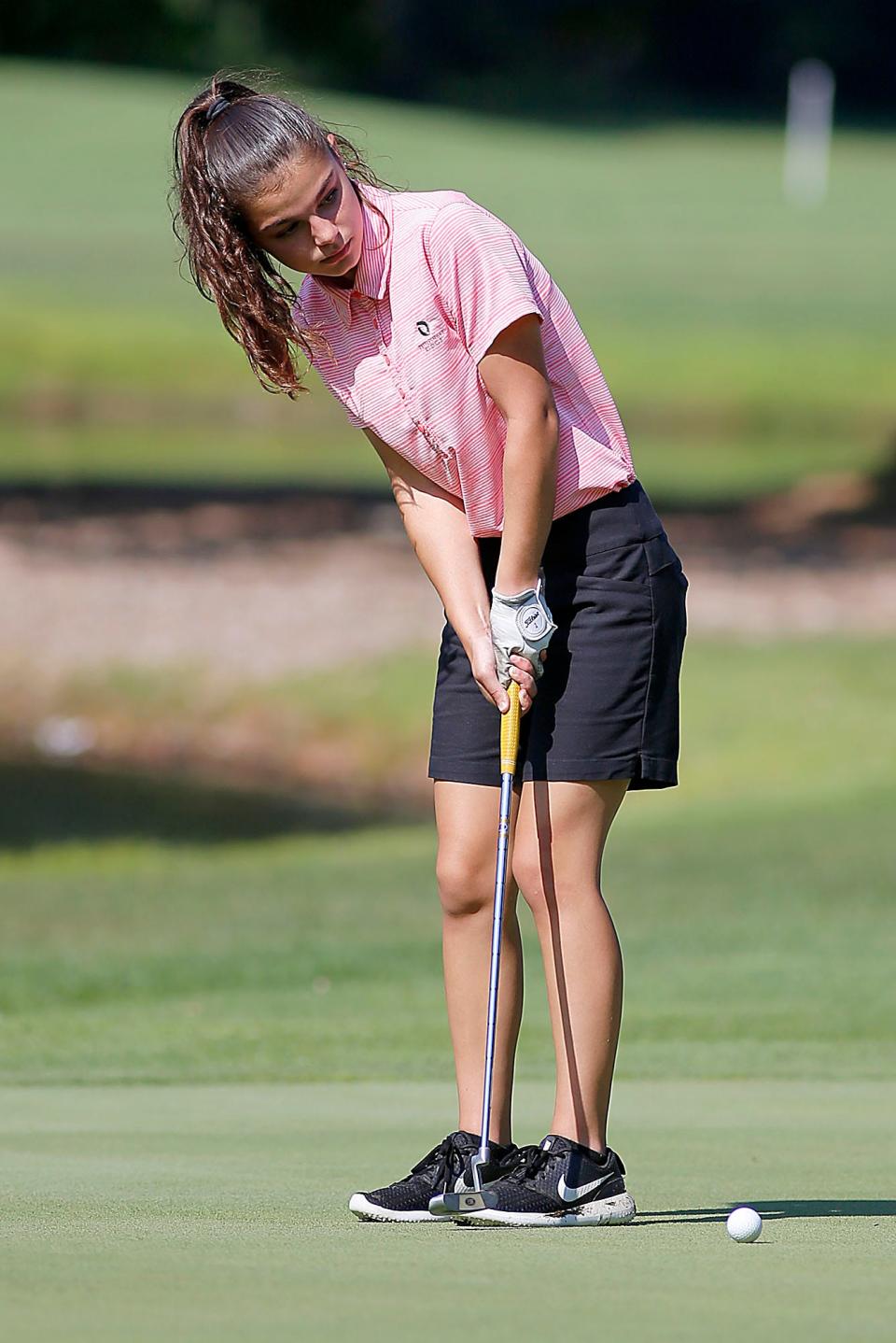 Elleni Miller putts during the first round of the Times-Gazette Junior golf championships at Brookside Gold Course on Wednesday, July 20, 2022. TOM E. PUSKAR/ASHLAND TIMES-GAZETTE