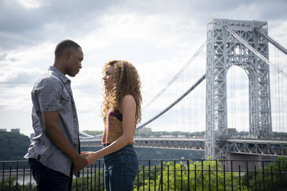 This image released by Warner Bros. Entertainment shows Corey Hawkins, left, and Leslie Grace in a scene from "In the Heights." (Macall Polay/Warner Bros. Entertainment via AP)