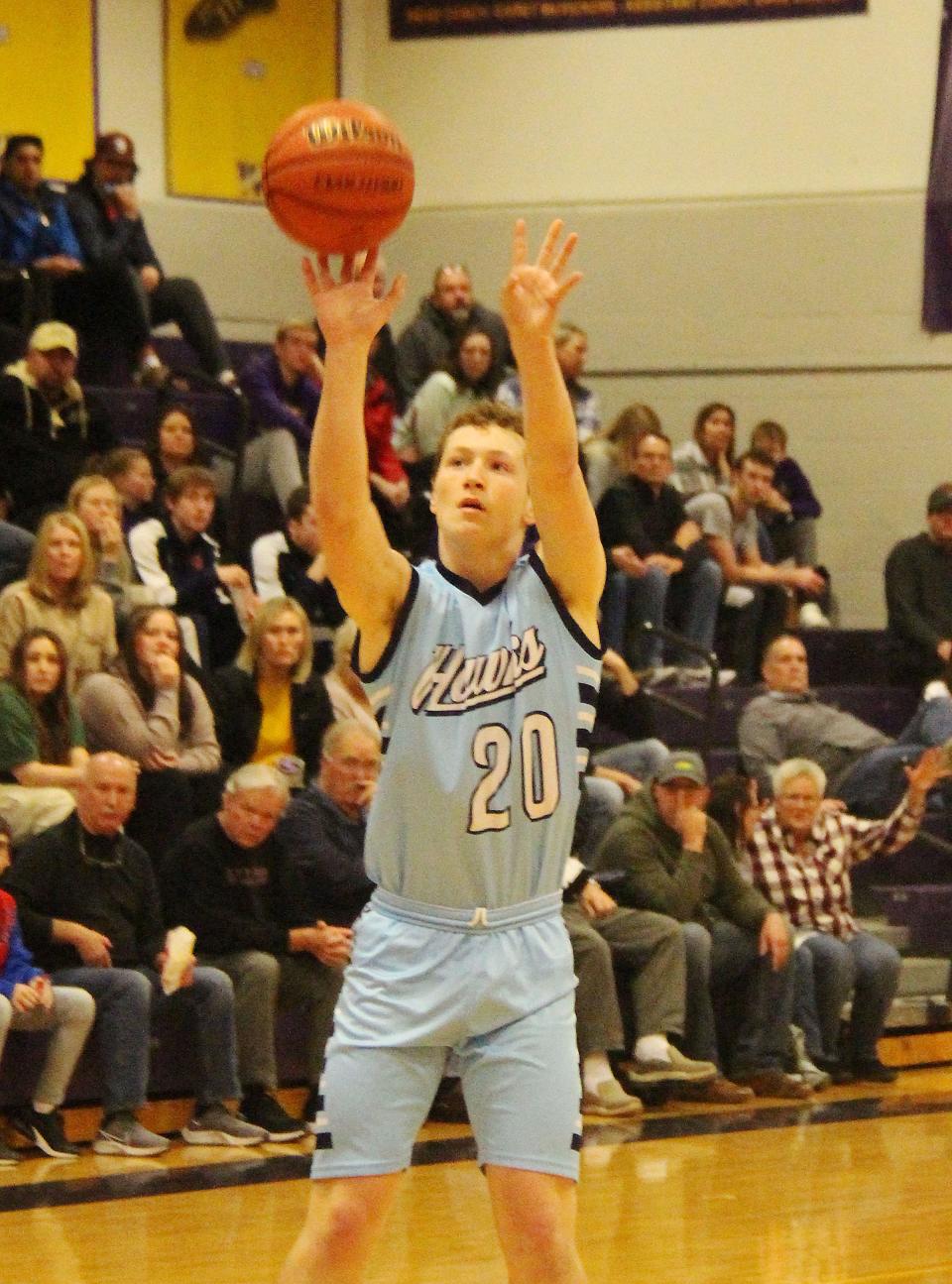 Prairie Central's Camden Palmore launches a 3-point shot Saturday against Pleasant Plains at the IPC-Sangamo Shootout. Pslmore scored 7 points in the Hawks' win.
