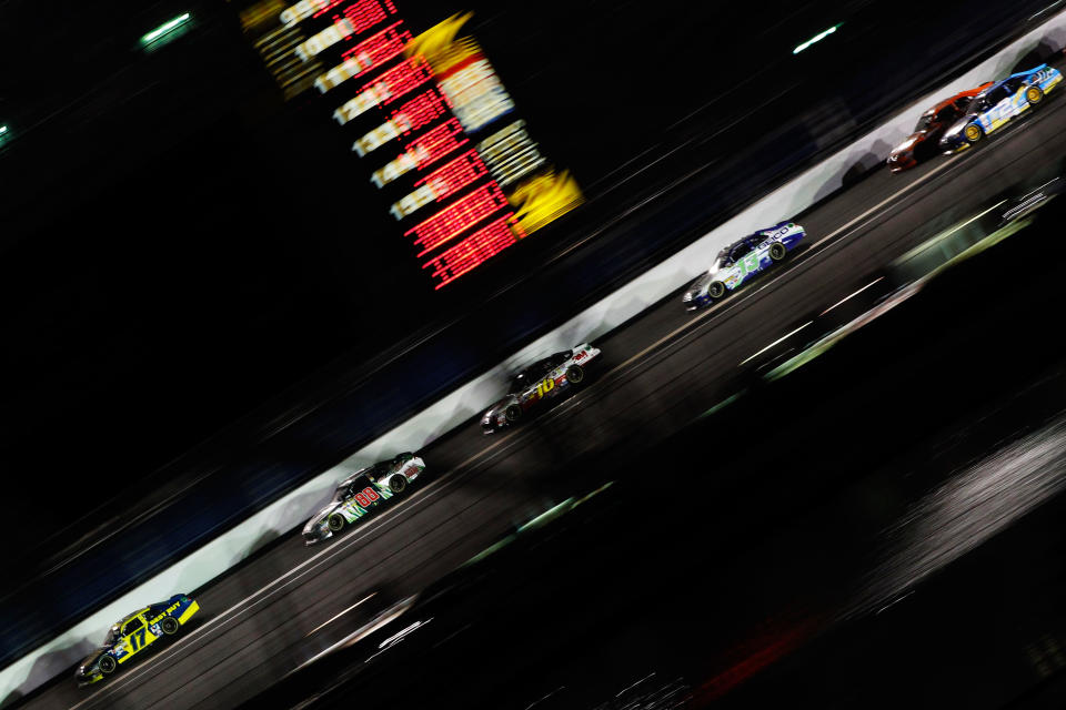 DAYTONA BEACH, FL - FEBRUARY 27: Matt Kenseth, driver of the #17 Best Buy Ford, leads Dale Earnhardt Jr., driver of the #88 Diet Mountain Dew/National Guard Chevrolet, Greg Biffle, driver of the #16 3M Ford, Casey Mears, driver of the #13 GEICO Ford, and Brad Keselowski, driver of the #2 Miller Lite Dodge, down the backstretch during the NASCAR Sprint Cup Series Daytona 500 at Daytona International Speedway on February 27, 2012 in Daytona Beach, Florida. (Photo by Tom Pennington/Getty Images for NASCAR)