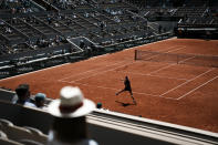 Spectators watch Russia's Veronika Kudermetova playing Russia's Daria Kasatkina during their quarterfinal match of the French Open tennis tournament at the Roland Garros stadium Wednesday, June 1, 2022 in Paris. (AP Photo/Thibault Camus)