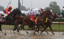 May 5, 2018; Louisville, KY, USA; Mike Smith aboard Justify (7) during the 144th running of the Kentucky Derby at Churchill Downs. Mandatory Credit: Brian Spurlock-USA TODAY Sports