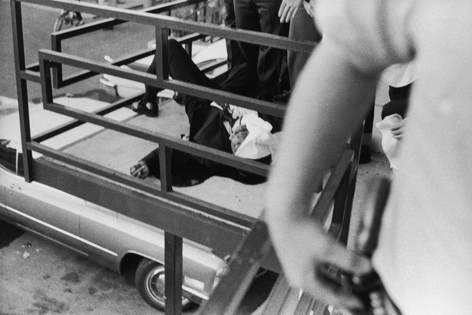 <p>A view of the partially covered body of slain civil rights leader Dr. Martin Luther King, Jr., on the balcony of the Lorraine Motel. (Photo: Joseph Louw/The LIFE Images Collection/Getty Images) </p>