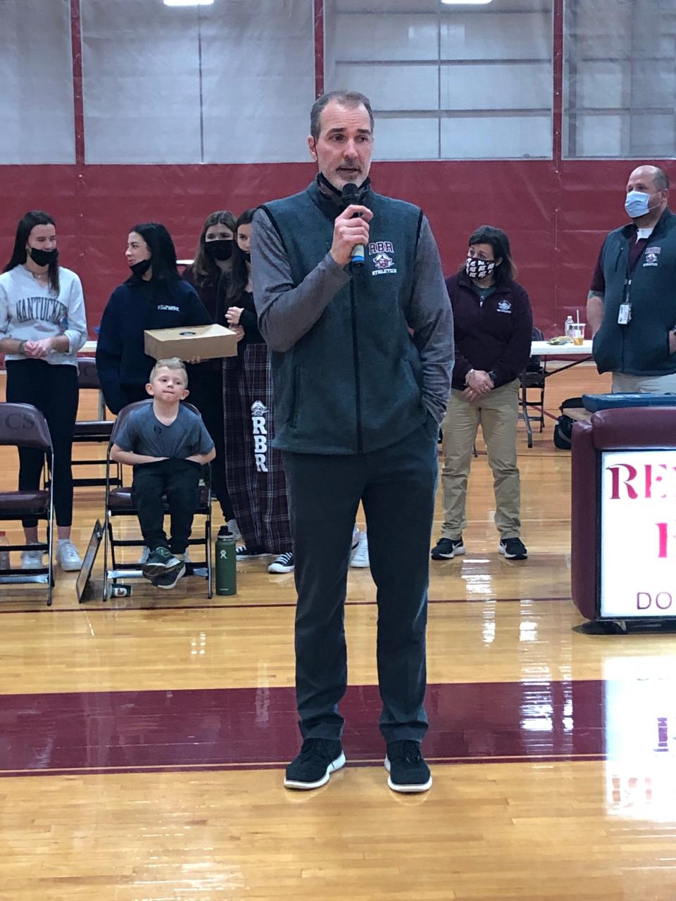 Red Bank Regional boys basketball coach Scott Martin speaks to the home crowd for the last time as he's stepping down following the conclusion of the Bucs season.