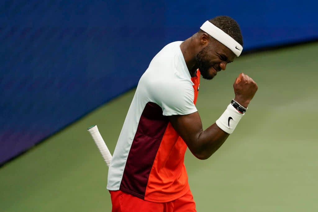 Frances Tiafoe reacts after winning a tie breaker against Andrey Rublev, of Russia, during the quarterfinals of the U.S. Open tennis championships, Wednesday, Sept. 7, 2022, in New York. (AP Photo/Seth Wenig)