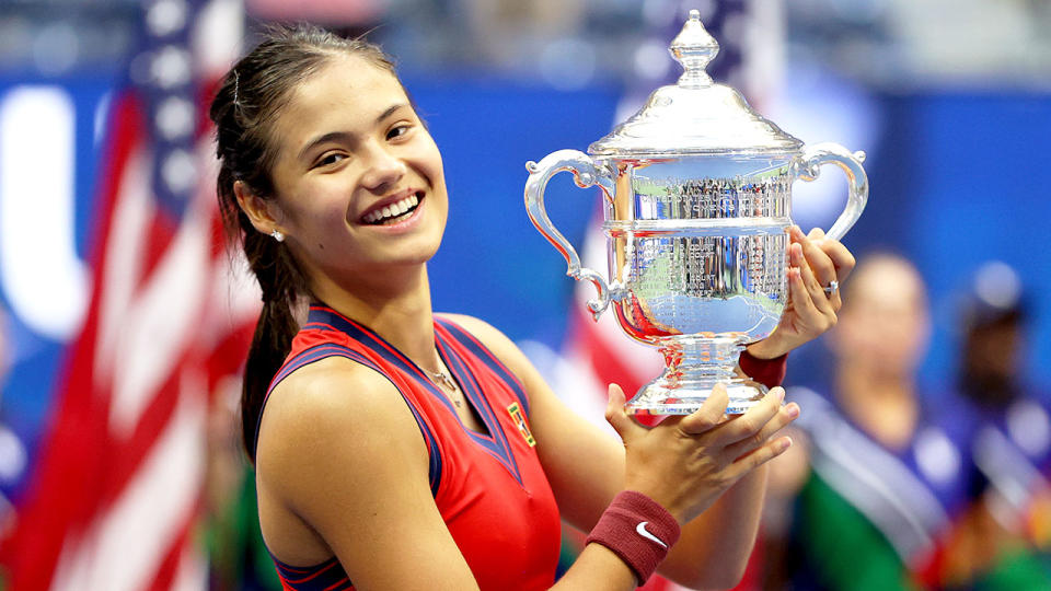 Pictured here, Emma Raducanu smiles with delight after winning the US Open title in 2021.