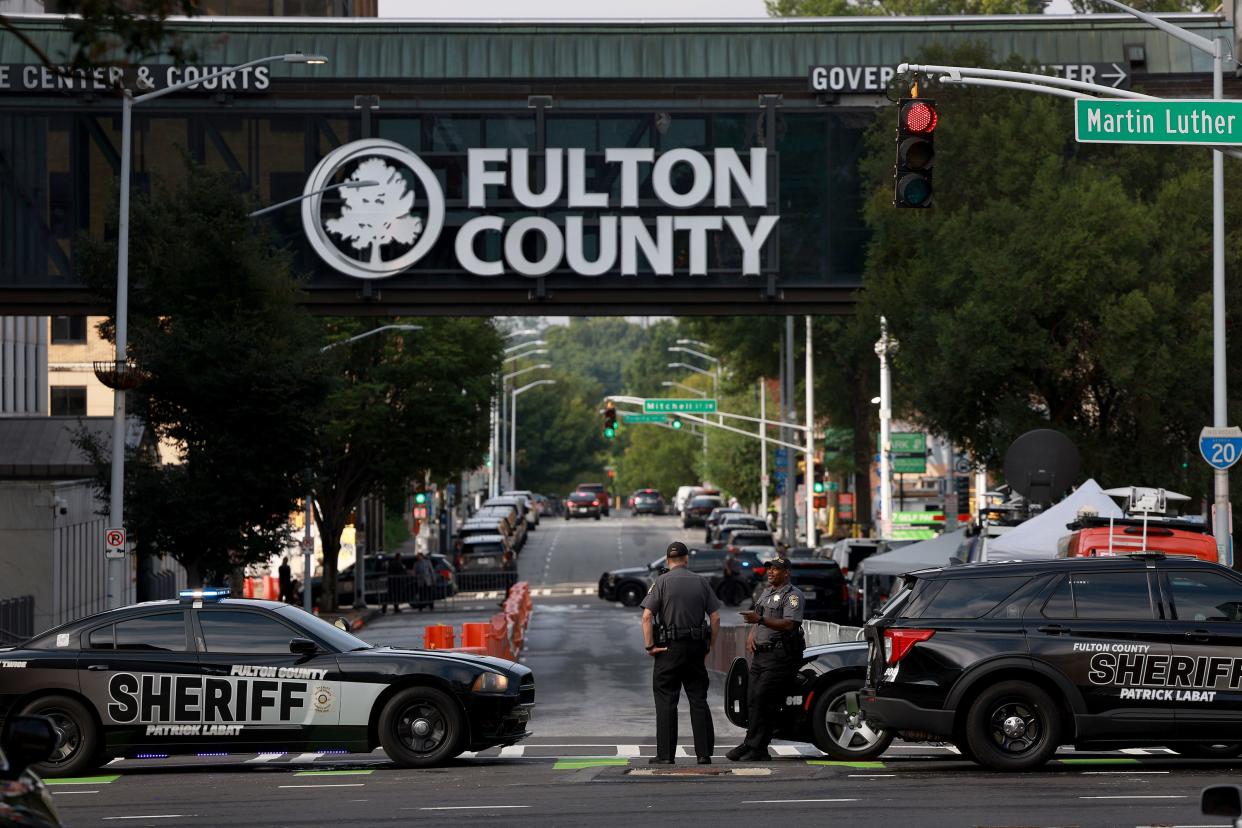 August 7, 2023: Fulton County Sheriff officers block off a street in front of the Fulton County Courthouse in Atlanta, Georgia.