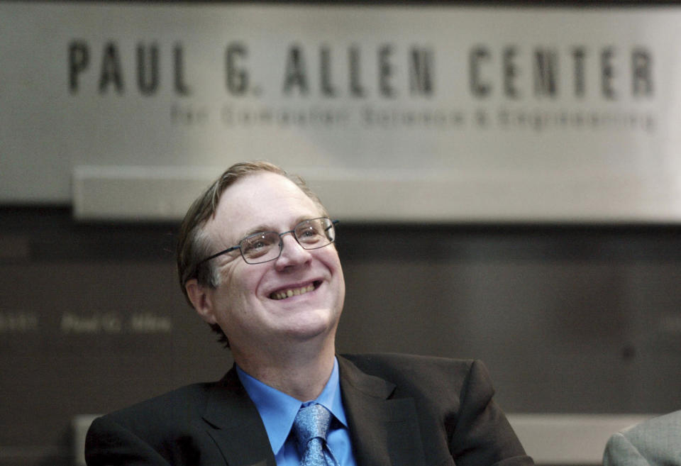 FILE - In this Oct. 9, 2003 file photo, Paul Allen, Microsoft co-founder for the dedication of the Paul G. Allen Center for Computer Science and Engineering at the University of Washington in Seattle. Prior to his death on Monday, Oct. 15, 2018, Allen invested large sums in technology ventures, research projects and philanthropies, some of them eclectic and highly speculative. Outside of bland assurances from his investment company, no one seems quite sure what happens now. (AP Photo/John Froschauer, File)