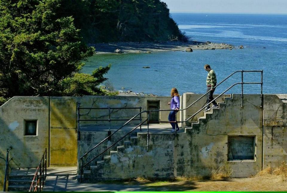 Jenny Springer and Jeff Beesler explore the remains of Battery Kinzie at Fort Worden State Park in Port Townsend. The fort was a film location for “An Officer and a Gentleman.”