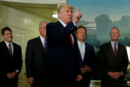 FILE PHOTO: U.S. President Donald Trump responds to a reporter's question after signing a memorandum at the White House in Washington, U.S. on August 14, 2017. REUTERS/Jonathan Ernst/File Photo