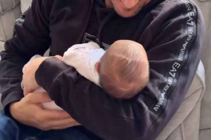 Peter with his newborn daughter -Credit:Peter Andre Instagram