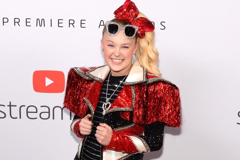 <p>Siwa surprised her fans when she posted a viral <a href="https://www.tiktok.com/@itsjojosiwa/video/6920027355633224966?refer=embed&is_copy_url=1&is_from_webapp=v2" rel="nofollow noopener" target="_blank" data-ylk="slk:TikTok;elm:context_link;itc:0;sec:content-canvas" class="link ">TikTok</a> lipsyncing to Lady Gaga's "Born This Way" in January 2021.</p> <p>"No matter gay, straight, or bi, lesbian, transgendered life, I'm on the right track baby, I was born to survive," Siwa sang while wearing a rainbow-covered bow. </p> <p>Many fans began congratulating the <em>Dance Moms </em>alumna for coming out, especially after after she showed off a new T-shirt, reading "Best. Gay. Cousin. Ever," on Twitter. "My cousin got me a new shirt," she simply <a href="https://twitter.com/itsjojosiwa/status/1352719582977355777" rel="nofollow noopener" target="_blank" data-ylk="slk:wrote;elm:context_link;itc:0;sec:content-canvas" class="link ">wrote</a> alongside the photo of her wearing the top.</p> <p>Siwa <a href="https://people.com/music/jojo-siwa-really-happy-lgbtq-community/" rel="nofollow noopener" target="_blank" data-ylk="slk:then went on Instagram Live to chat with her fans;elm:context_link;itc:0;sec:content-canvas" class="link ">then went on Instagram Live to chat with her fans</a> and, in reponse to a fan who asked, "What label are you?" the star said: "I have thought about this, but the reason I'm not going to say this answer is because I don't really know this answer. I think humans are awesome, I think humans are really incredible people. Right now, I'm super duper happy and I want to share everything with the world but I also want to keep things in my life private until they are ready to be public. Right now what matters is that you guys know that no matter who you love, that it's okay. It's awesome and the world is there for you. There are so many people that are there for you. I know everyone's situation is different and it might be harder for some people and easier for some people to come out or be themselves but I think coming out has this stigma around it — that it's this really, really scary thing, but it's not anymore. There are so many accepting and loving people out there that it's okay. Of course people are going to say it's not normal, but nothing is normal. Literally not one thing about anybody is normal and it's okay not to be normal, it's okay to be a little different, it's okay to be a little weird, strange, different. That's something we should never, ever be afraid of. That's something we should be proud of. ... I'm the happiest I've ever been, that's what matters."</p>