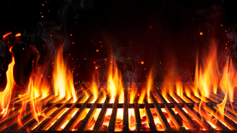 Big flames coming through grill